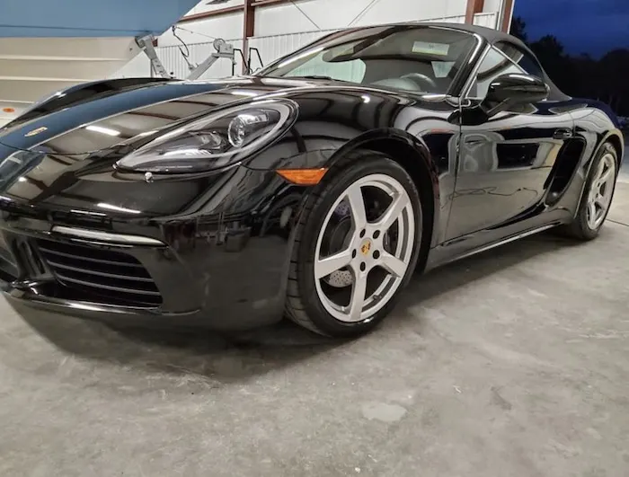 Black Porsche 718 with mirror gloss paint