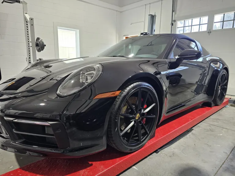 Black Porsche 911 Targa with a deep gloss
