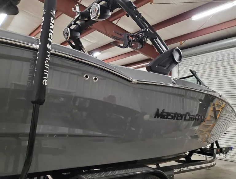Gray MasterCraft wake boat in the shop