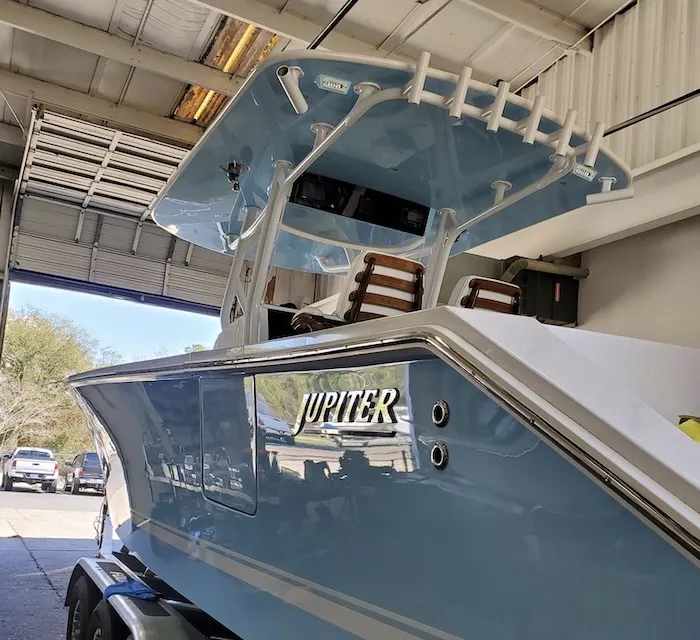 Light blue Jupiter center console boat