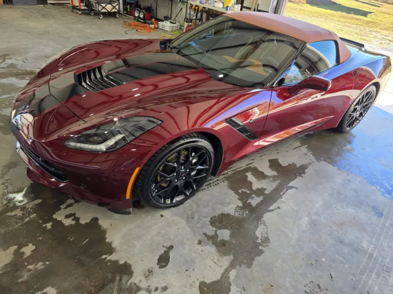 Red Chevrolet Corvette Stingray with a deep gloss