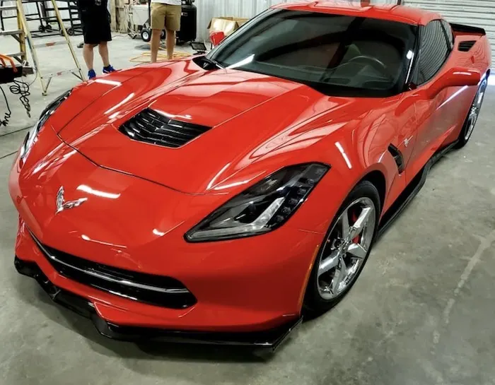 Red Chevrolet Corvette Z06 hood and fender