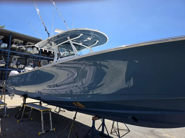 The Valhalla bow with Yacht Armor film, reflecting the marina
