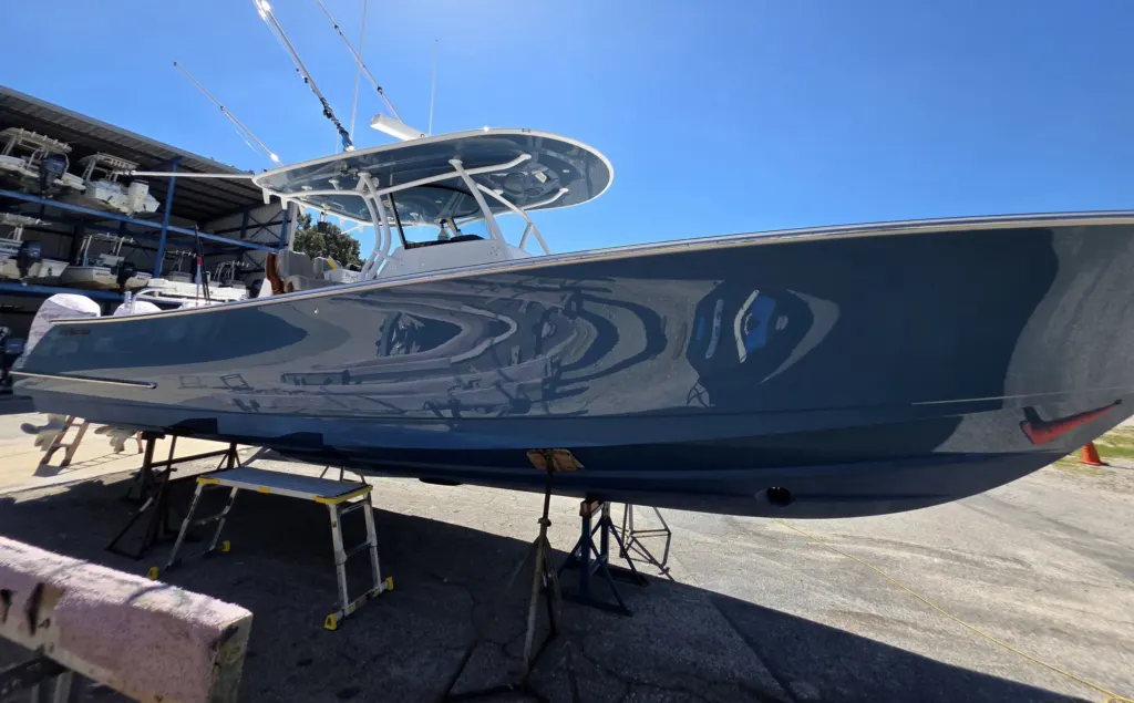 The Valhalla hull side with Yacht Armor film, on stands at the marina